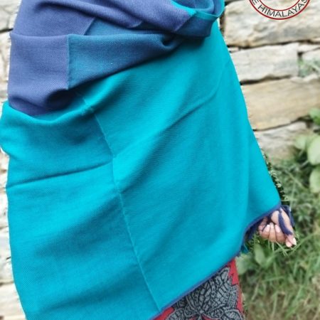 Handwoven women's woollen shawl from Kilmora in shades of blue ranging from azure to cobalt.