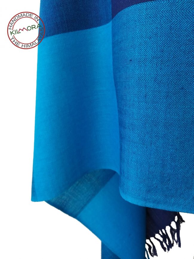 Handwoven women's woollen shawl from Kilmora in bold checks of turquoise, navy, purple and indigo