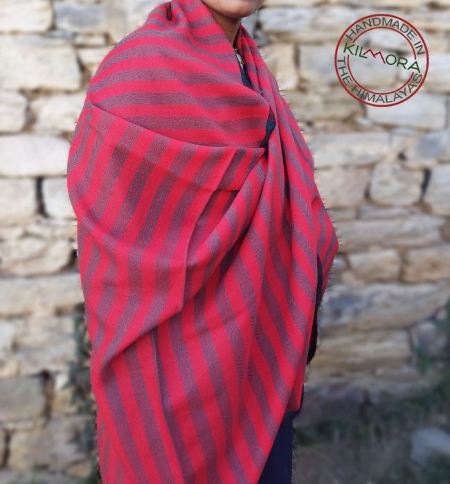 Handwoven women's woollen shawl from Kilmora in bold vertical stripes of mahogany and current with a black edging.