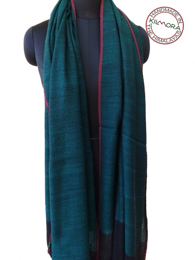 Handwoven women's woollen shawl from Kilmora in peacock blue with an edging of cerise
