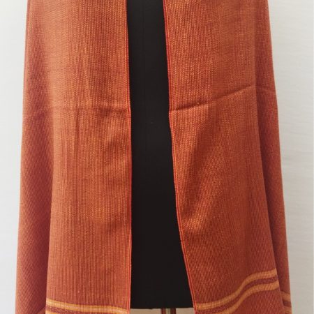 Handwoven shawl from Kilmora in tangerine with a beautiful weave pattern to elevate this shawl to one of effortless style and chic.