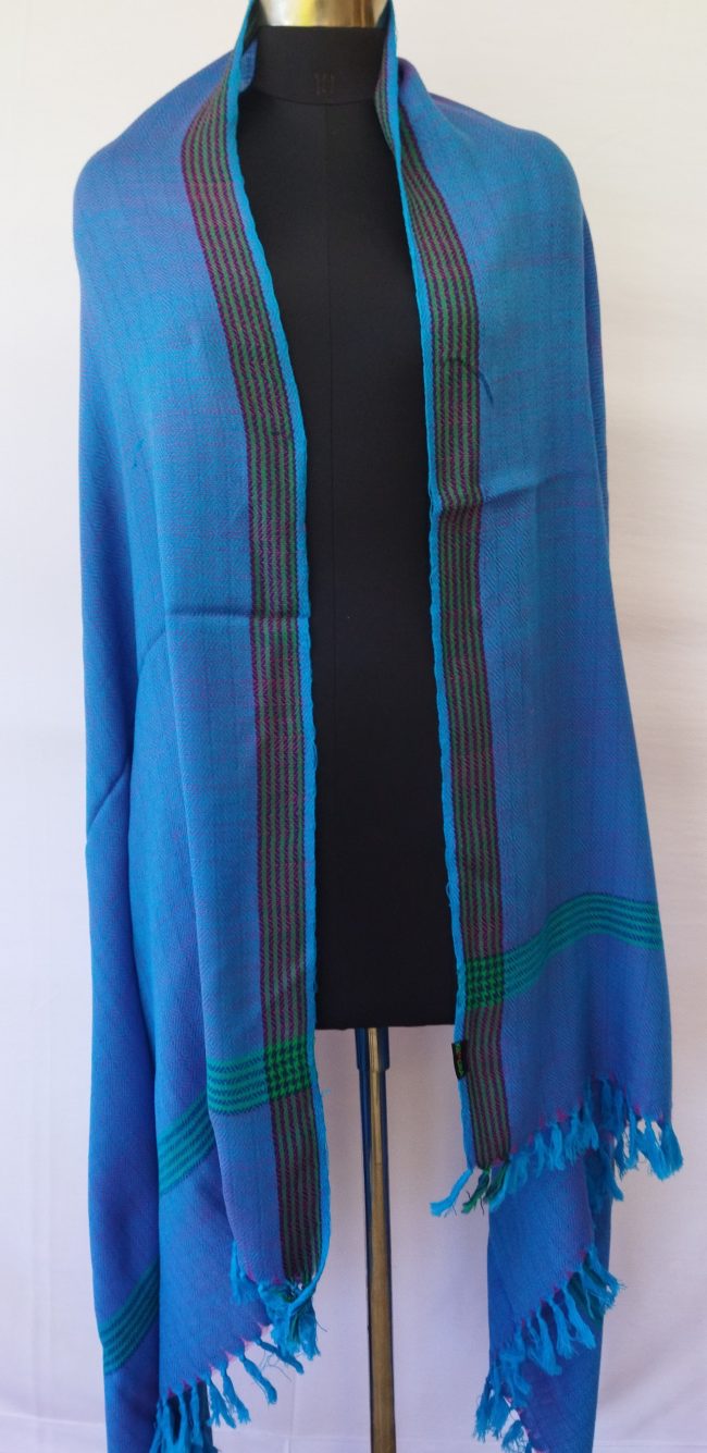 Handwoven pure merino wool shawl from Kilmora in azure blue double shaded with a hint of magenta for added richness.