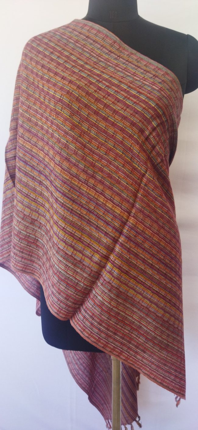 Pure merino wool hand-woven stole with a beautiful honeycomb like pattern and in thin stripes of purple, yellow, lavender, black, navy blue, royal blue, magenta, maroon.