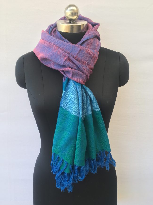 Double shaded merino wool stole from Kilmora. In eggplant and azure with a bold border of teal, and azure
