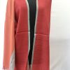 Bold, variegated stripes in tomato, orange, red and grey make up this merino wool shawl from Kilmora