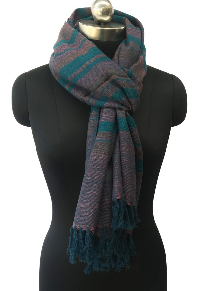Pure merino wool stole with thick vertical stripes of rich peacock blue intermingled with deep wine red.