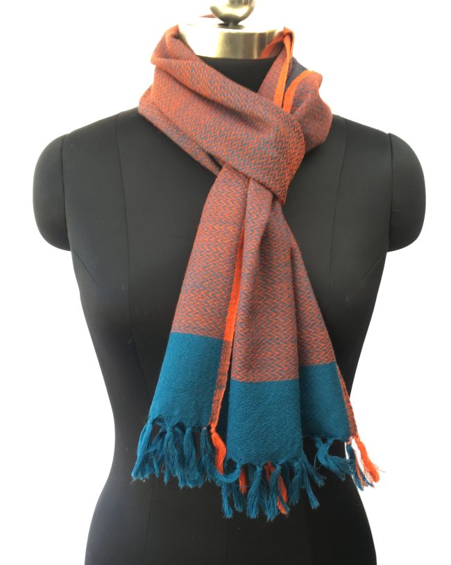 Pure merino wool scarf in double shades of peacock blue and vivid orange with an orange border
