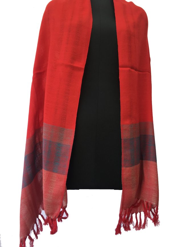 Pure merino wool stole from Kilmora in rose red, with a thick border of electric blue and red