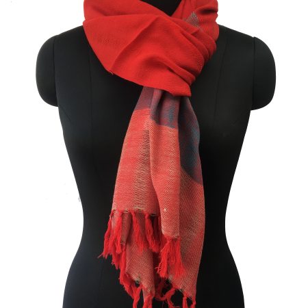 Pure merino wool stole from Kilmora in rose red, with a thick border of electric blue and red