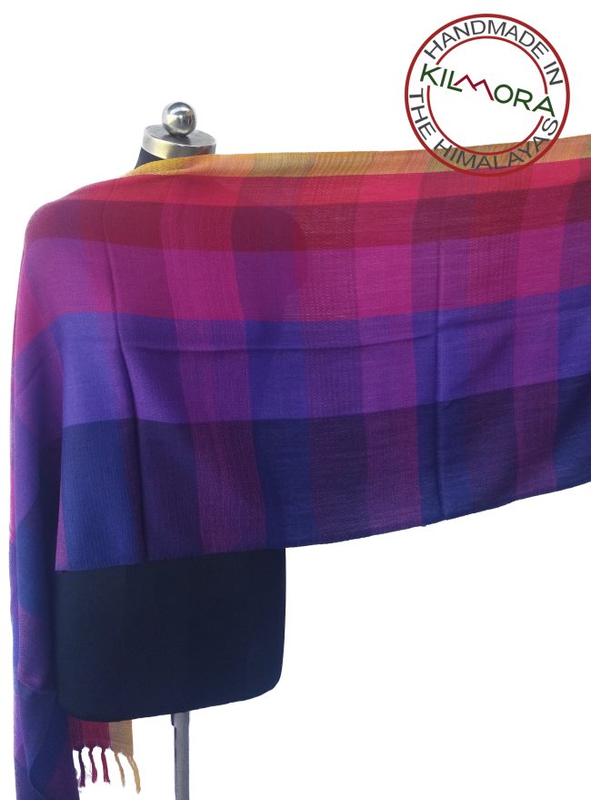 Pure wool stole from Kilmora in bold checks. Of aubergine, violet, plum, scarlet, vermilion and edged with canary yellow.