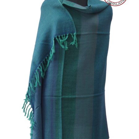 Pure woollen shawl from Kilmora. With bold vertical stripes in shades of azure, cobalt, cornflower, cerulean and pine.