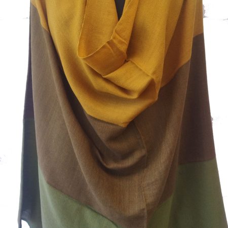 Pure woollen shawl from Kilmora in bold horizontal stripes of of honey, walnut and fern.