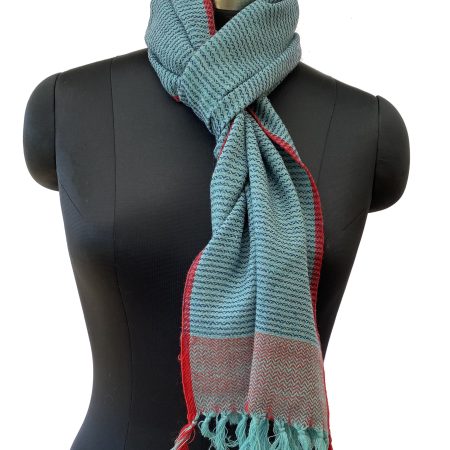 Teal blue merino wool scarf with vertical stripes, double shaded border and a cherry red edging