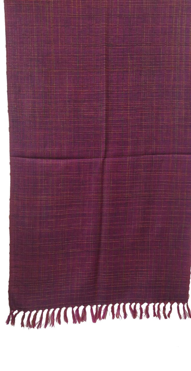 Handwoven woollen stole in a shade of rich wine purple. Patterned with random checks in light lemon yellow.