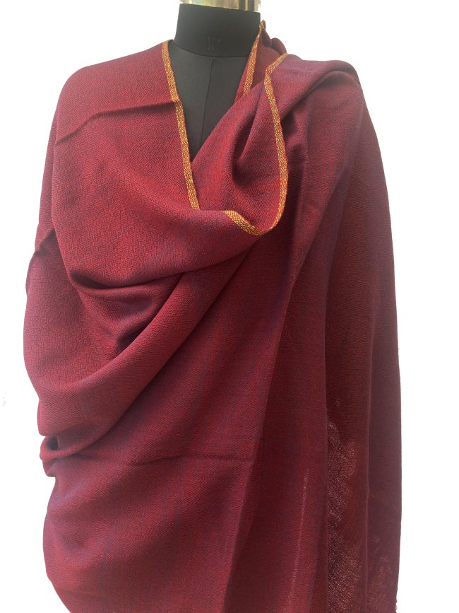 Handwoven merino wool shawl with horizontal bands of mahogany, ruby red and maroon with a thin selvedge in muted gold