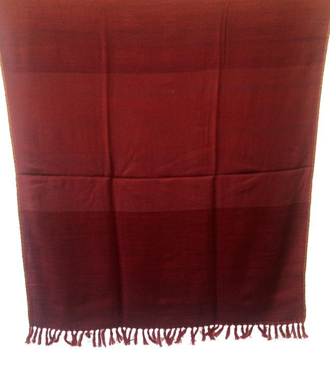 Handwoven merino wool shawl with horizontal bands of mahogany, ruby red and maroon with a thin selvedge in muted gold