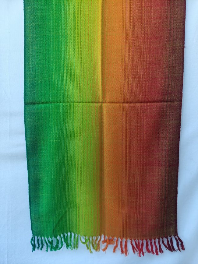 Merino wool stole in gradation weave - in shades of forest, shamrock and lime green followed by autumnal orange and mahogany