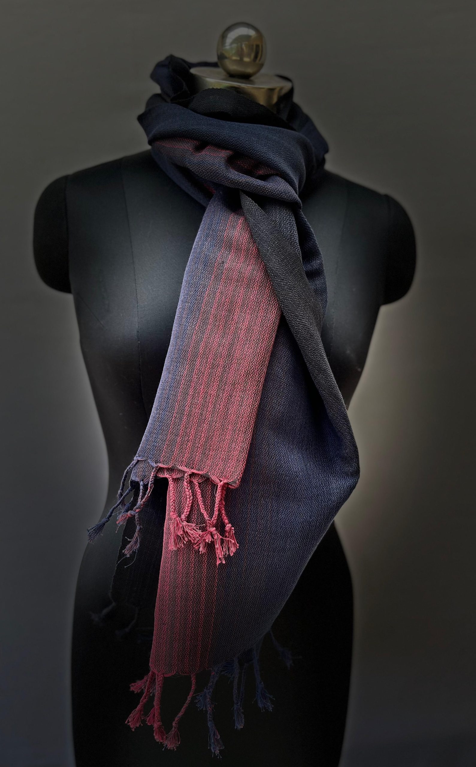 Hand woven cotton-linen stole in deep black with a middle showing of crimson stripes