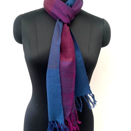 Handwoven merino wool scarf in bold checks in cobalt, purple, red and midnight blue.