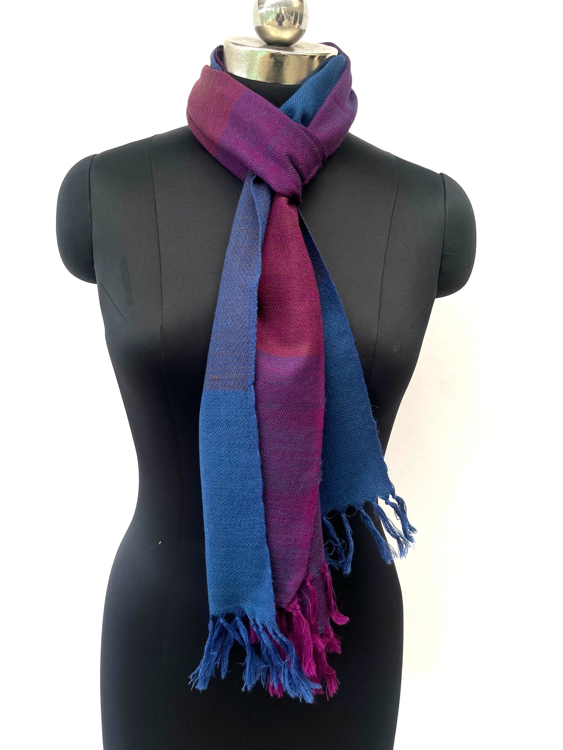 Handwoven merino wool scarf in bold checks in cobalt, purple, red and midnight blue.