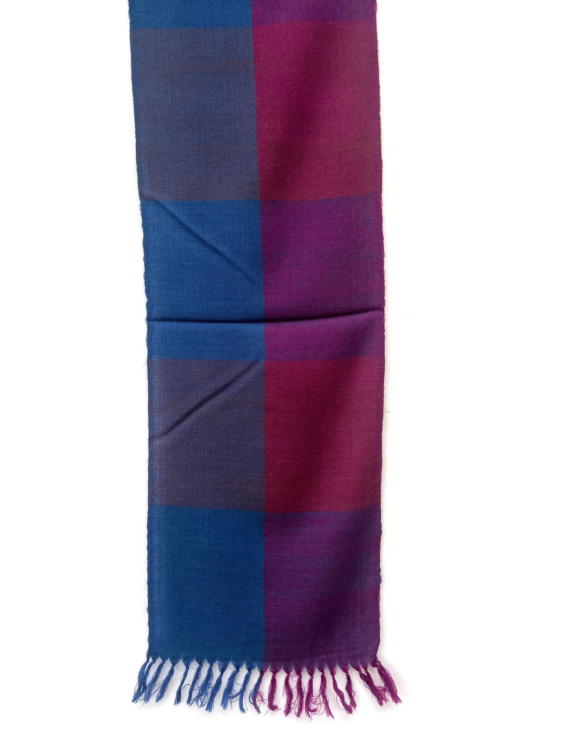 Handwoven merino wool scarf in bold checks in cobalt, purple, red and midnight blue.