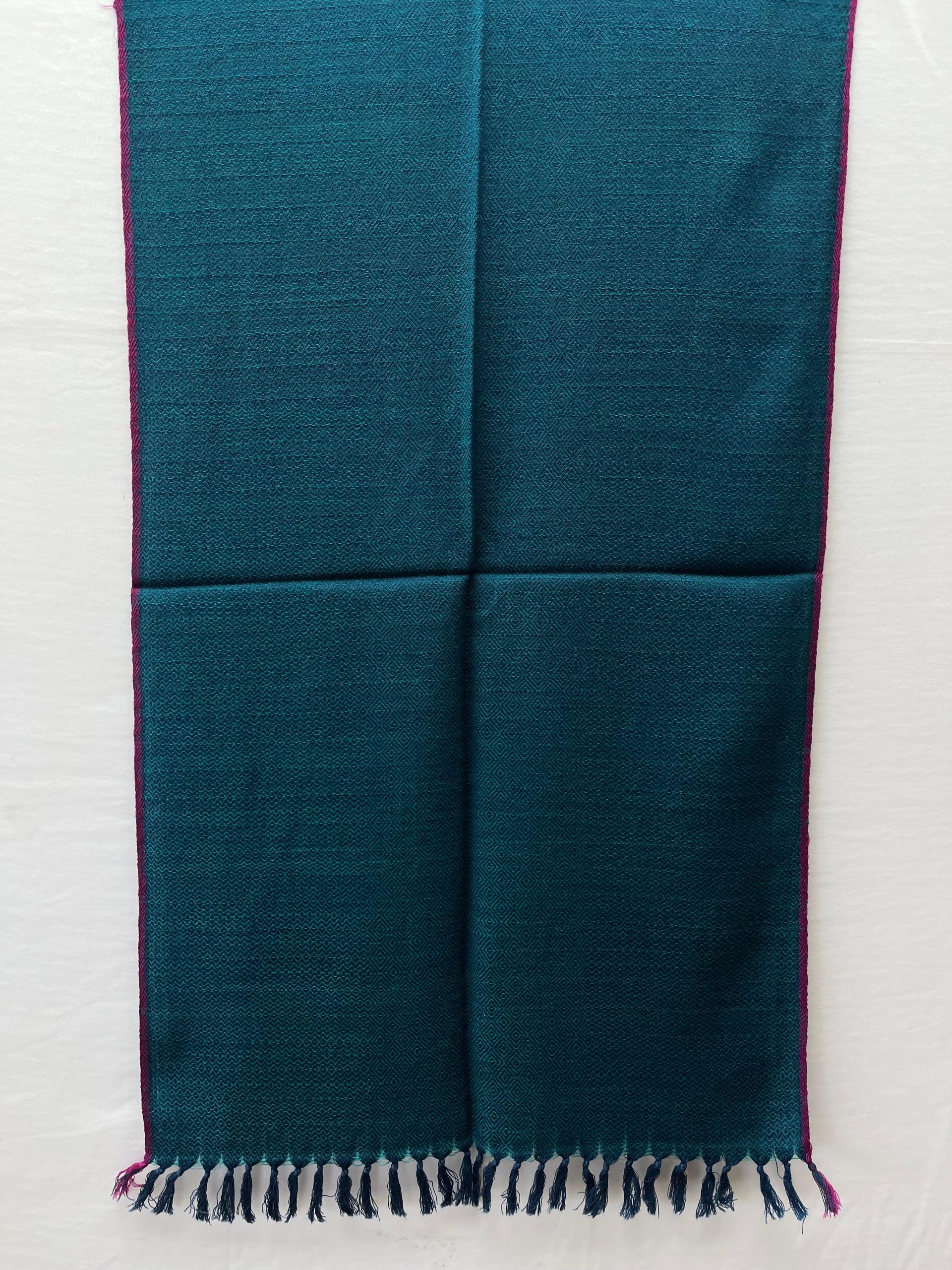 Handwoven merino wool stole in rich deep sapphire blue with a thin red selvedge