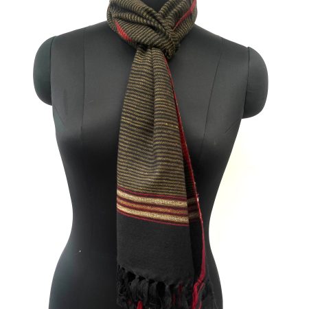 Handwoven merino wool scarf in black with a diamond pattern overlay in cream and a thin red selvedge