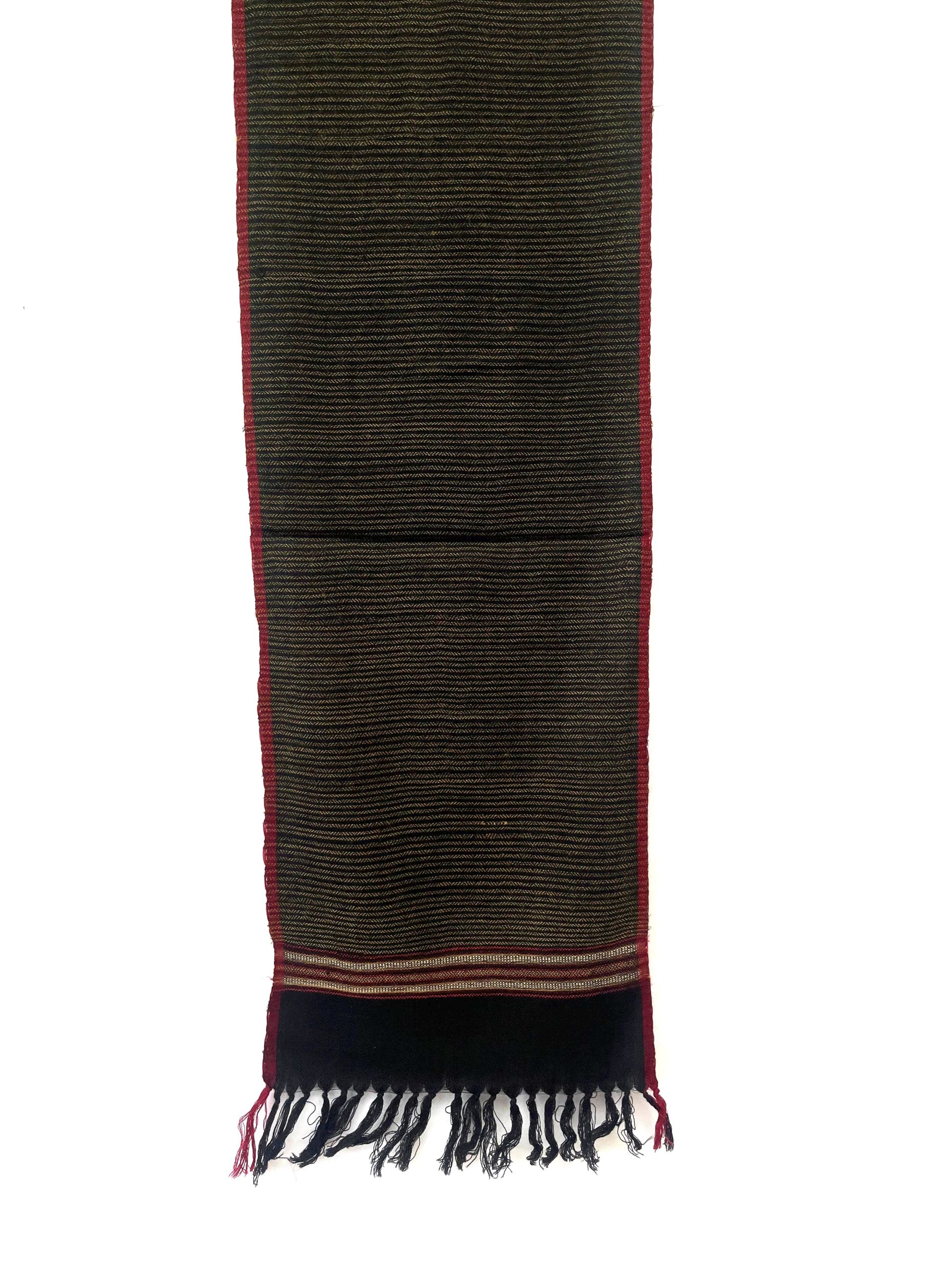 Handwoven merino wool scarf in black with a diamond pattern overlay in cream and a thin red selvedge