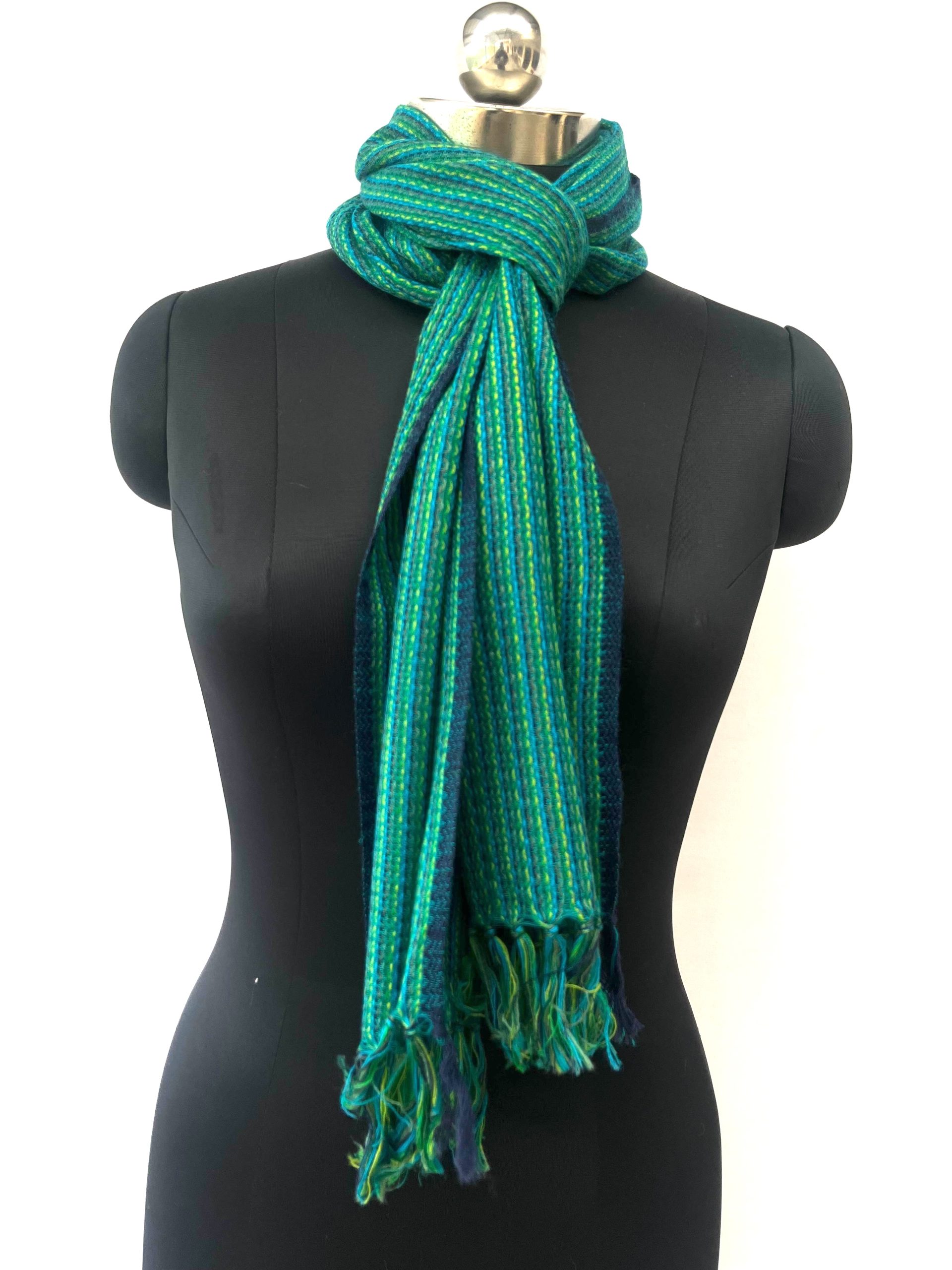 Merino wool scarf with think pin stripes in pine green, lime green and navy - woven over a base of deep pine green with a thin navy blue selvedge