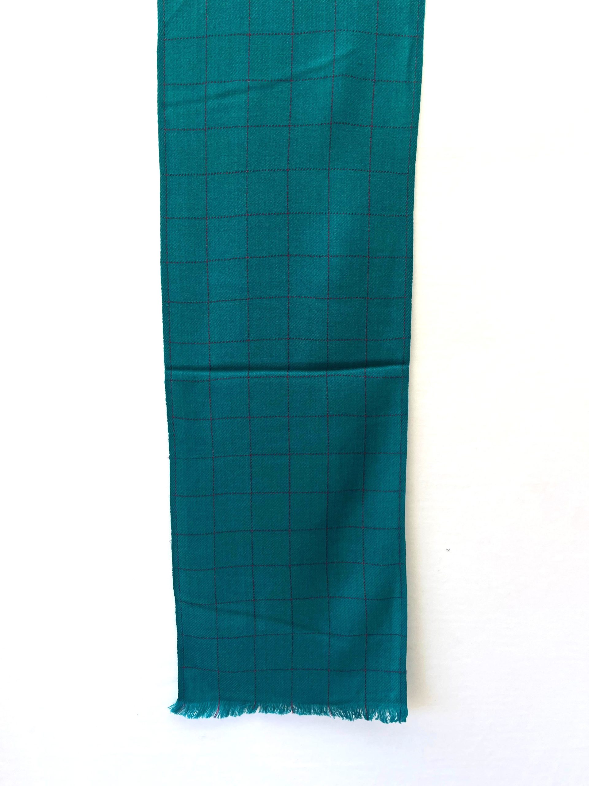 Handwoven merino wool scarf in teal with large navy checks woven into the design