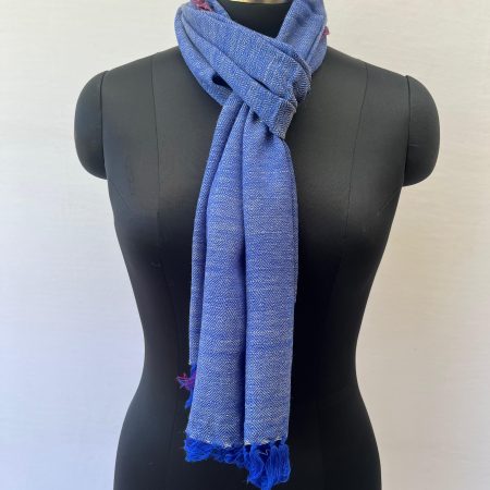 Handwoven merino wool scarf in royal blue diamond pattern with a white weft and thin red selvedge