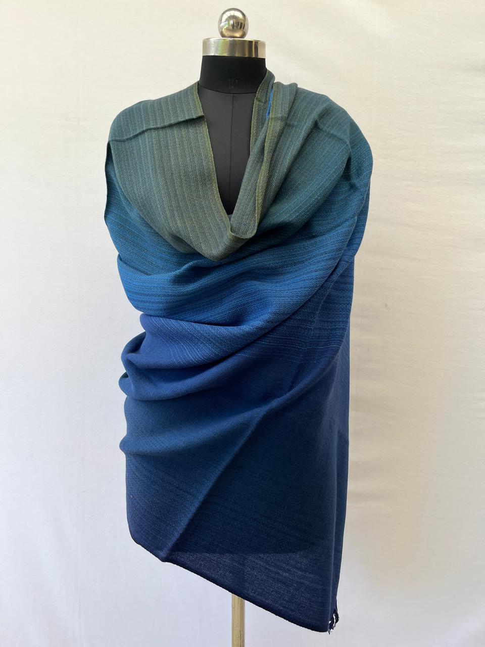 Hand-woven merino wool shawl in ombre weave with (from left to right) - blue green, indigo, cobalt and dark blue
