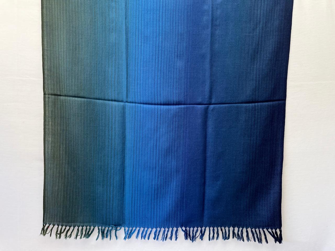 Hand-woven merino wool shawl in ombre weave with (from left to right) - blue green, indigo, cobalt and dark blue