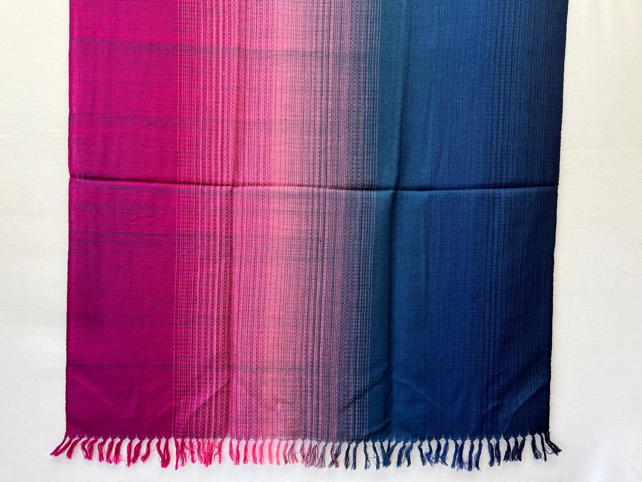 Hand-woven merino wool shawl in ombre weave with (from left to right) -magenta, pink, cobalt blue and navy blue