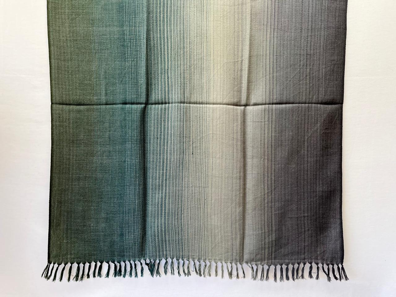 Hand-woven merino wool shawl in ombre weave with (from left to right) - pine green, teal, silver and warm gray