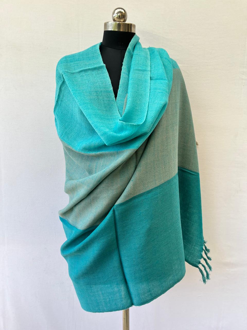 Hand-woven merino wool shawl in bold horizontal stripes of arctic, sapphire and sky blue