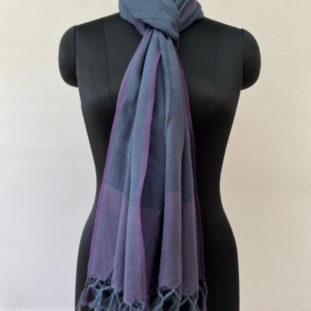 Hand woven cotton stole in royal purple with a light purple border. Knotted on a mannequin.