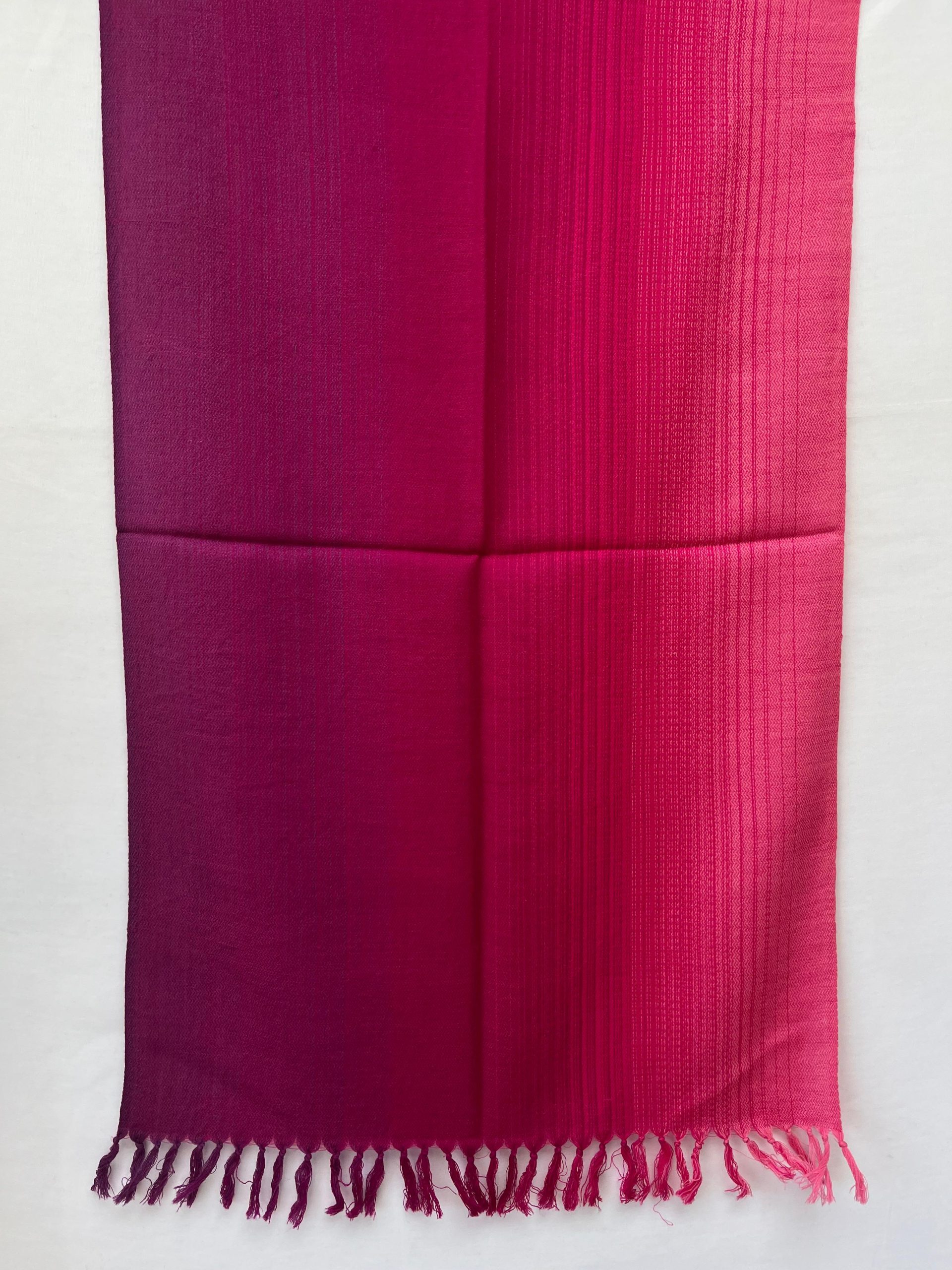 Ombre hand woven merino wool stole in shades of pink - graduating from cerise to hot pink