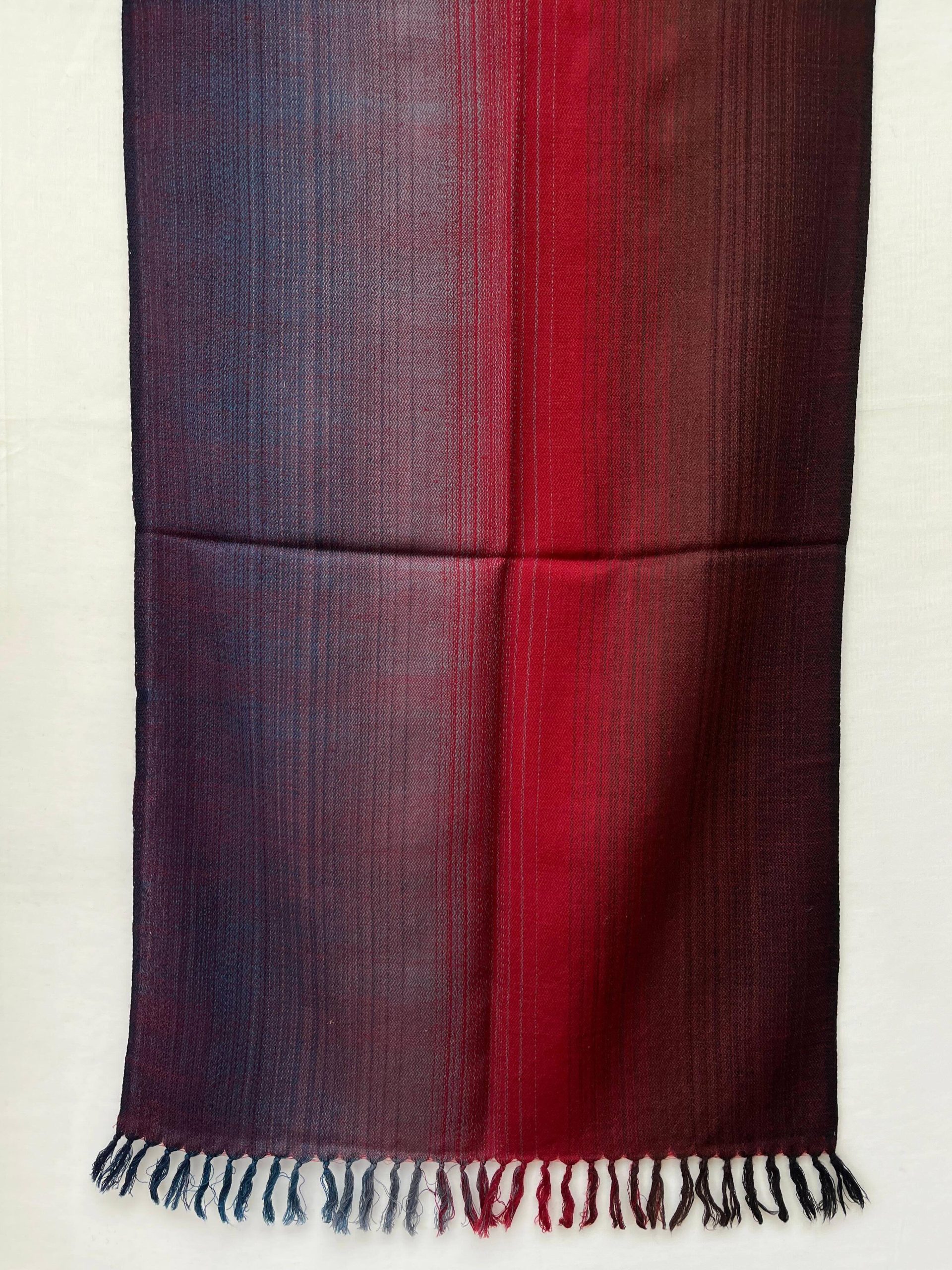 Ombre hand woven merino wool stole in deep purple, silver, wine red and ruby.