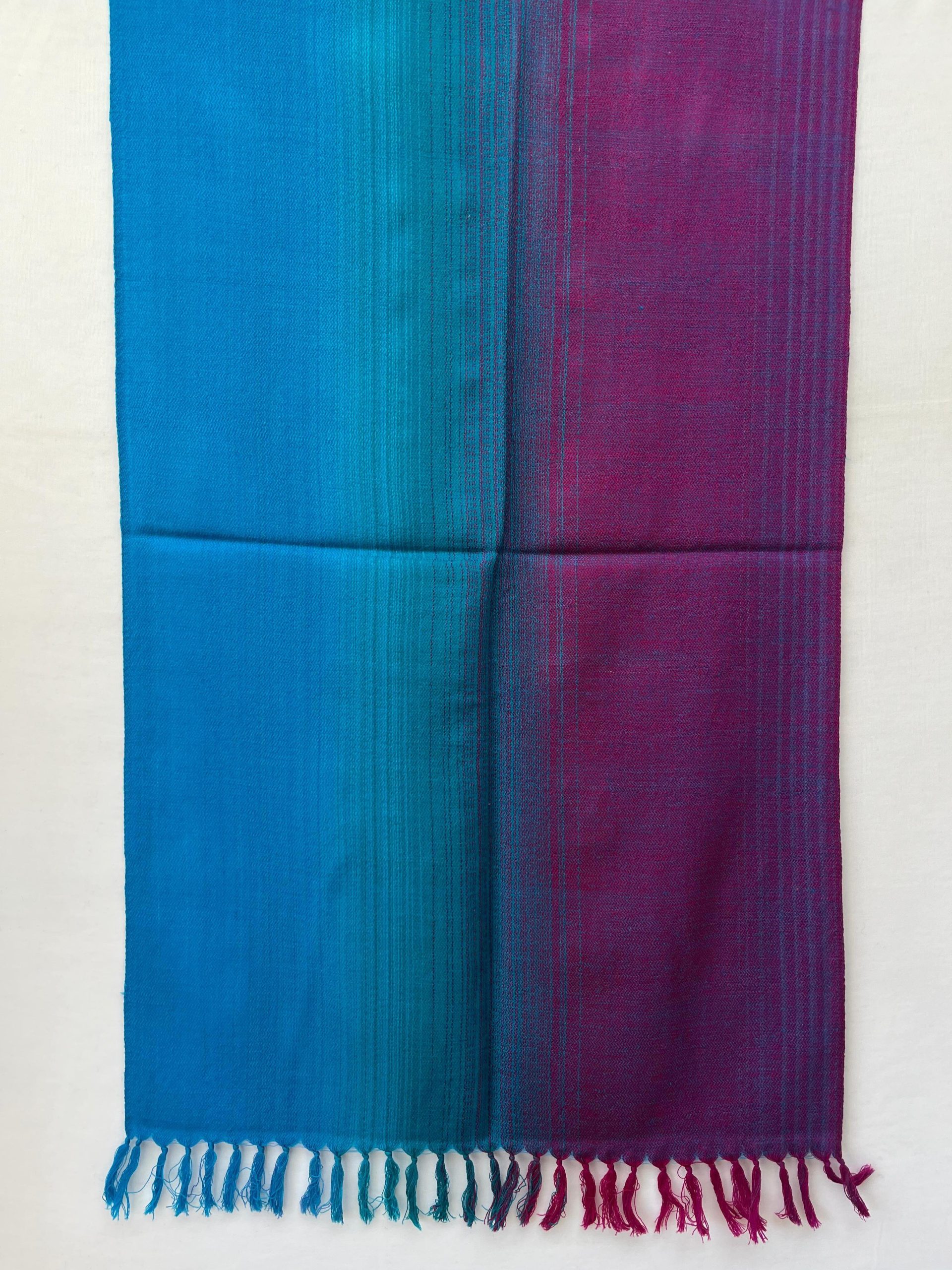 Ombre hand woven merino wool stole in blue, teal and plum.