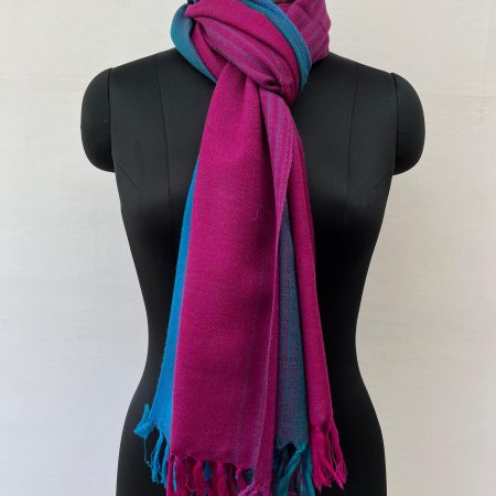 Ombre hand woven merino wool stole in a deep blue and deep aubergine.