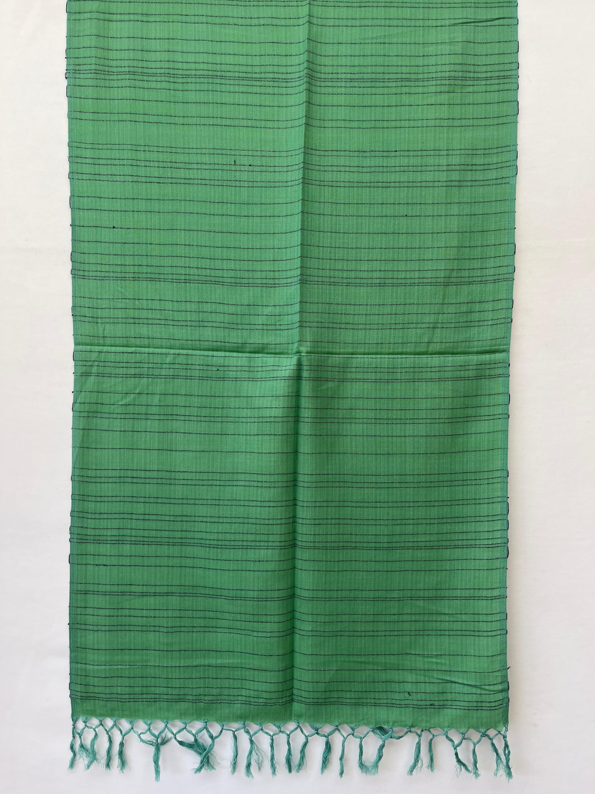Hand woven cotton stole in apple green with irregular horizontal stripes in navy blue.