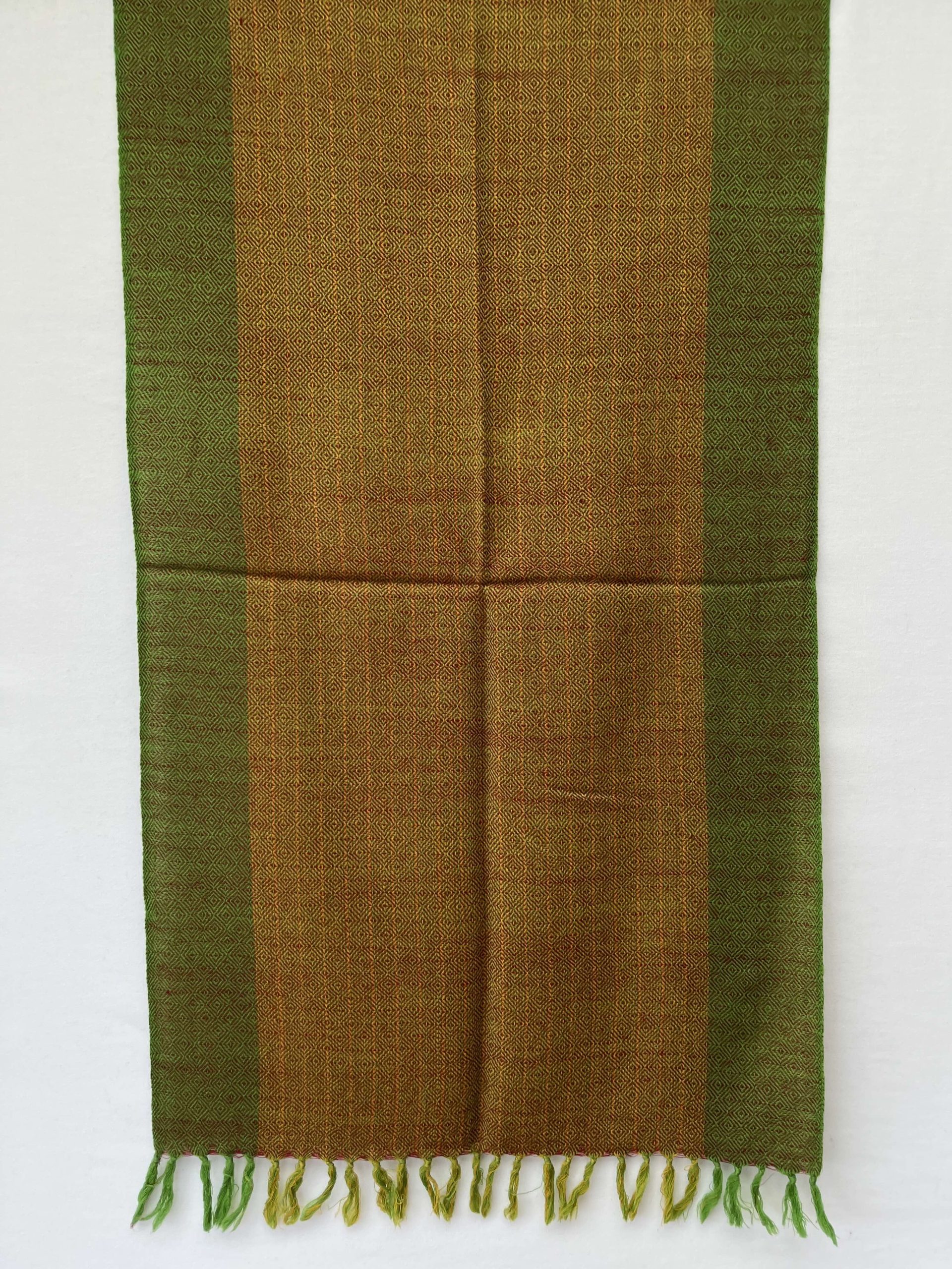 Hand-woven merino wool stole in mustard yellow with moss green border, and woven with a diamond weave.