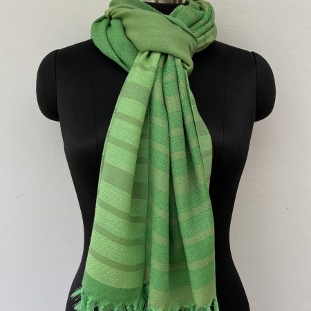 Hand woven merino wool stole with vertical stripes in shades of lime and pear green.