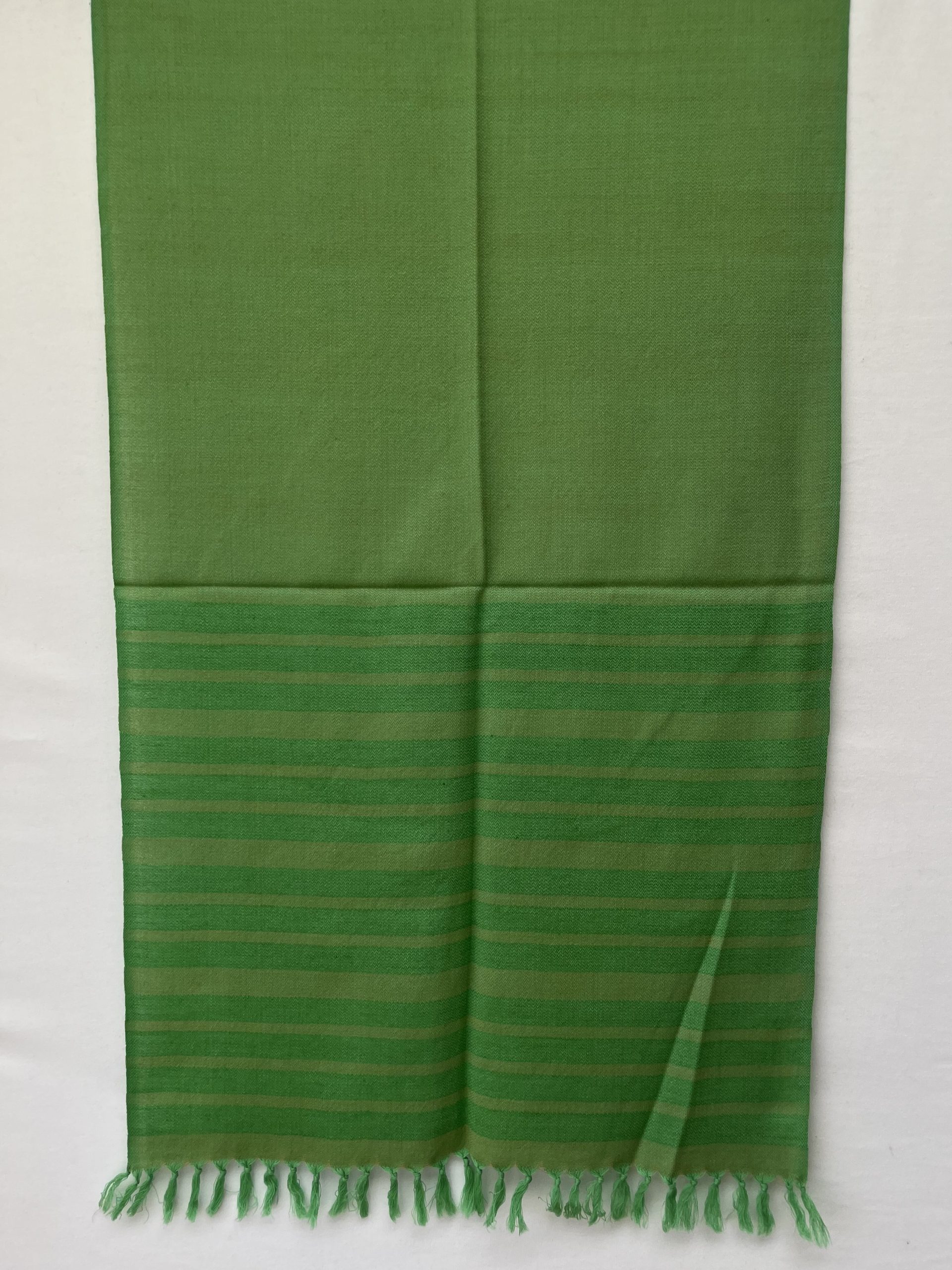 Hand woven merino wool stole with vertical stripes in shades of lime and pear green.